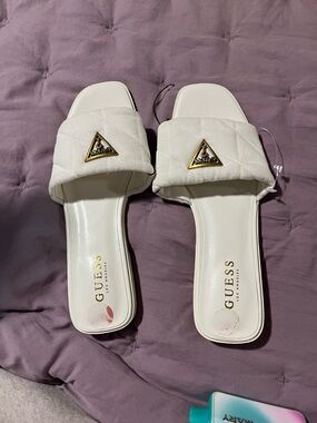 GUESS White Quilted Slide Mules with Gold Triangle Logo